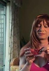 Lucimay eats a bowl of strawberries covered in warm