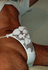 These little white panties barely hold this pantie boys bulging