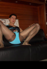 Muscular pantie lover wearing nylon stockings and