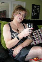 Horny tgirl bitch sipping on wine and posing  horny tgirl bitch sipping on wine and posing. Excited shemale bitch sipping on wine and posing