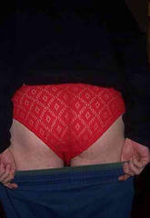 Slutty red panties cover this lascivious pantie boys