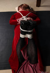 Excited lucimay is wearing a long velvet dress and is all