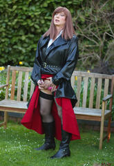 Juicy luci may wore her appealing long rubber trench coat