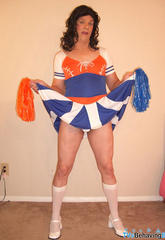 Naughty crossdresser dressed as a cheerleader gets have